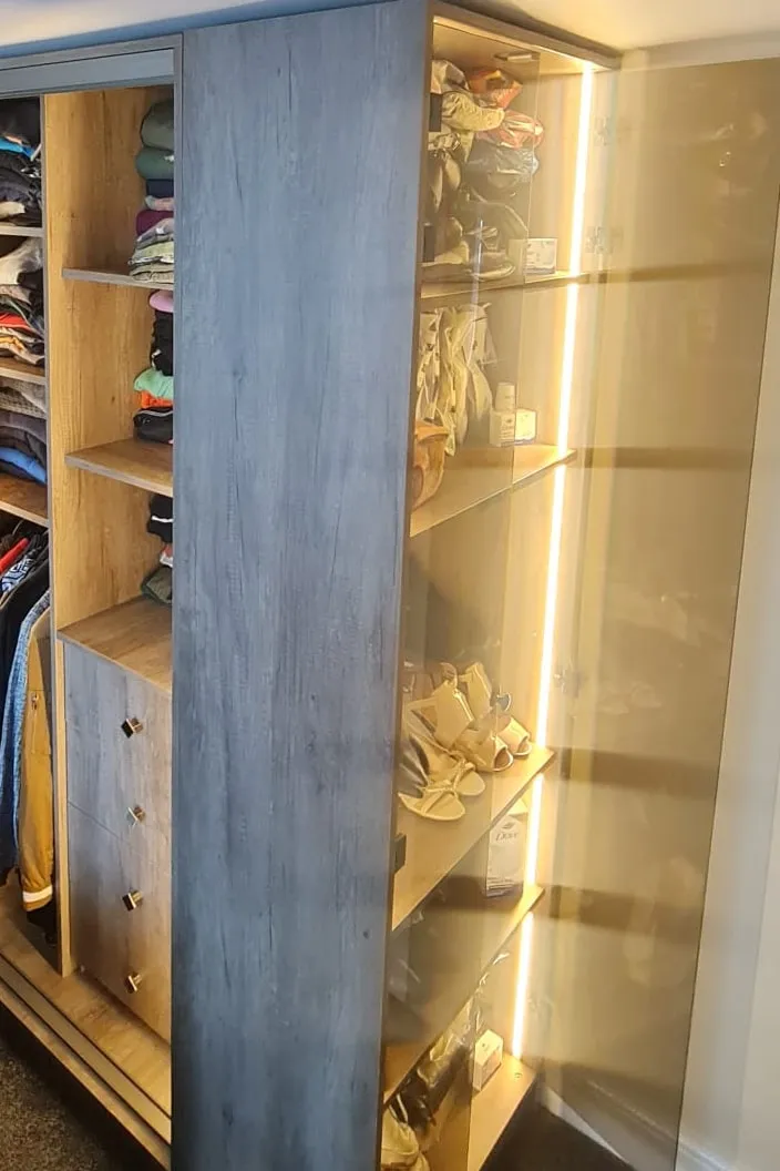 Made-to-measure wardrobe in grey oak with an LED-lit glass display cabinet for shoes, in a Great Barr bedroom